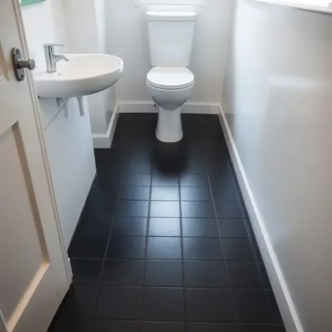 Czarna podłoga w małej łazience