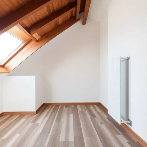 Podłogówka czy grzejniki na poddaszu